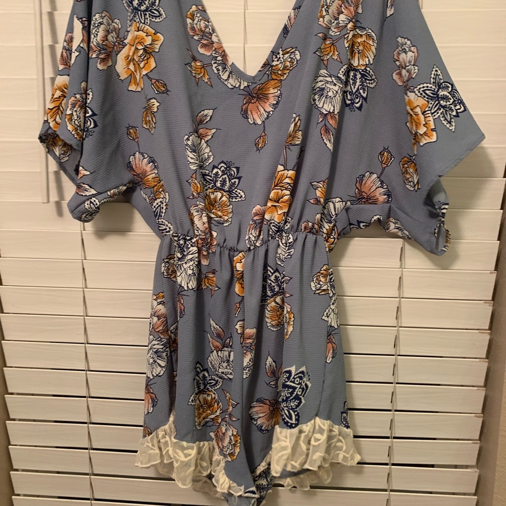 Charlotte Russe floral romper with open back. Lace bottom. Size Small.